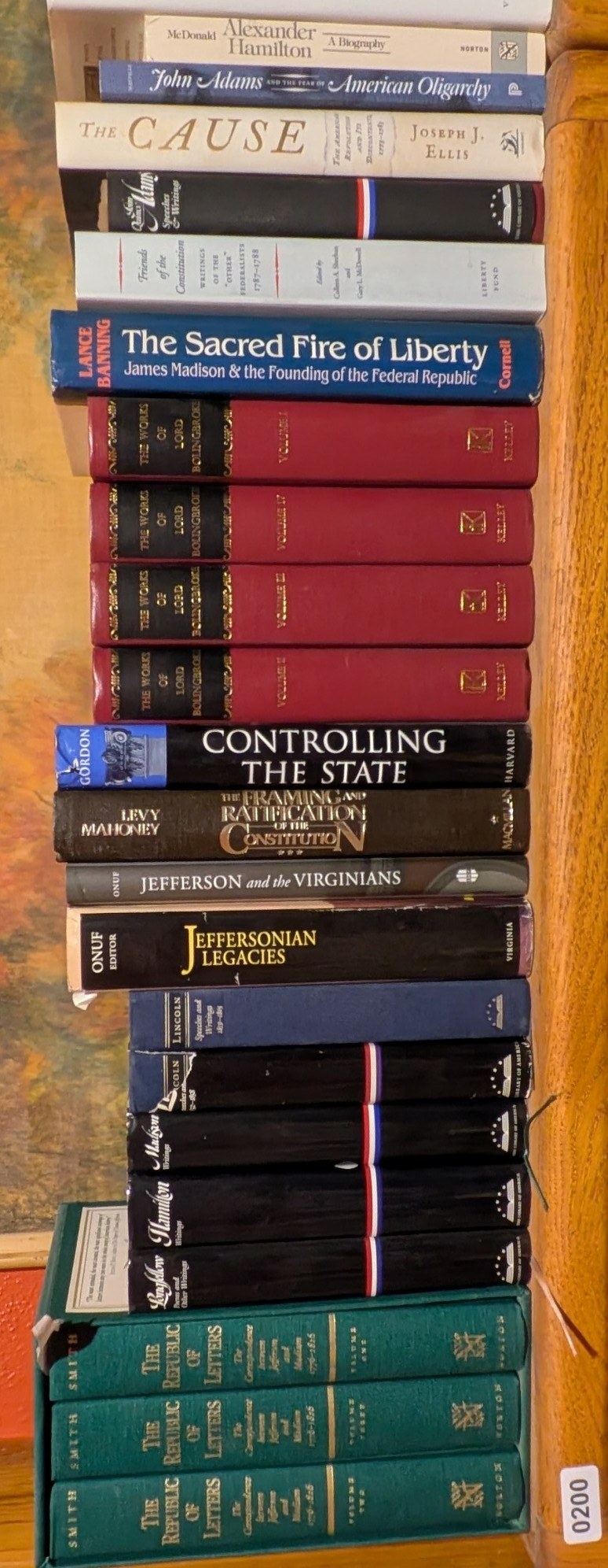 Photograph of Shelf 200 with readable book spines.