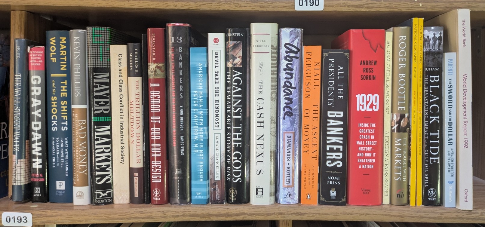 Photograph of Shelf 193; books are listed in top-to-bottom order alongside the photograph.