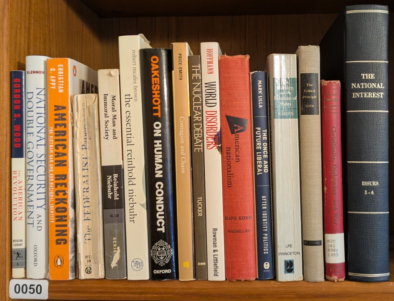 Photograph of Shelf 50 with readable book spines.