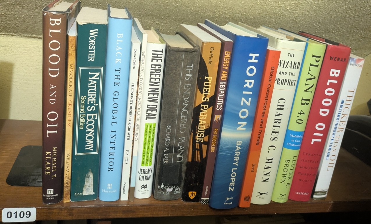 Photograph of Shelf 109; books are listed in top-to-bottom order alongside the photograph.