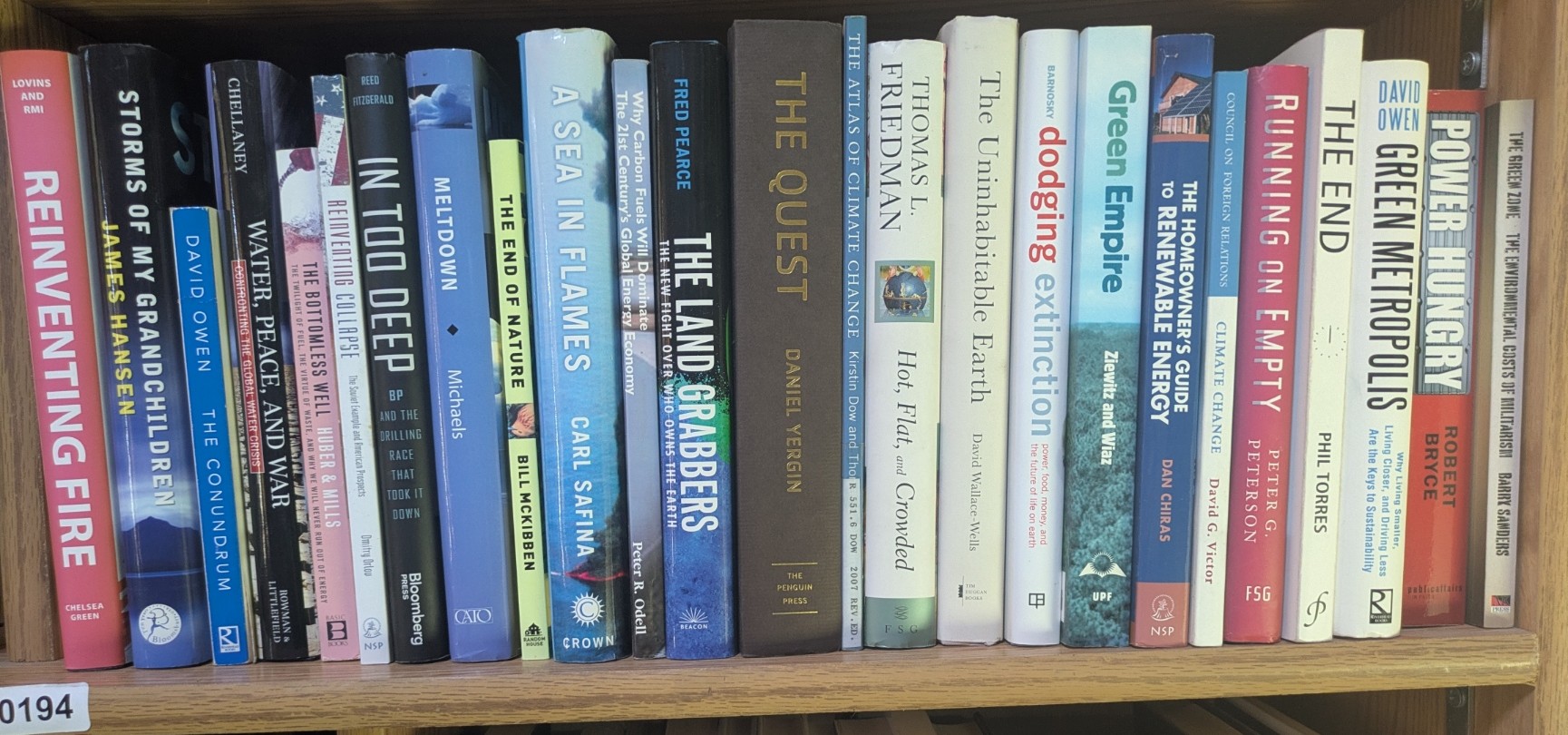 Photograph of Shelf 194; books are listed in top-to-bottom order alongside the photograph.