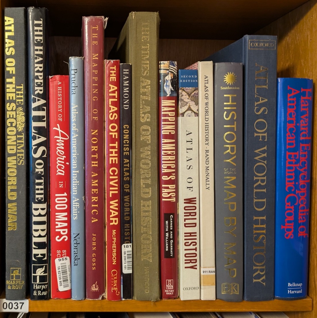 Shelf 37, atlas and reference books.