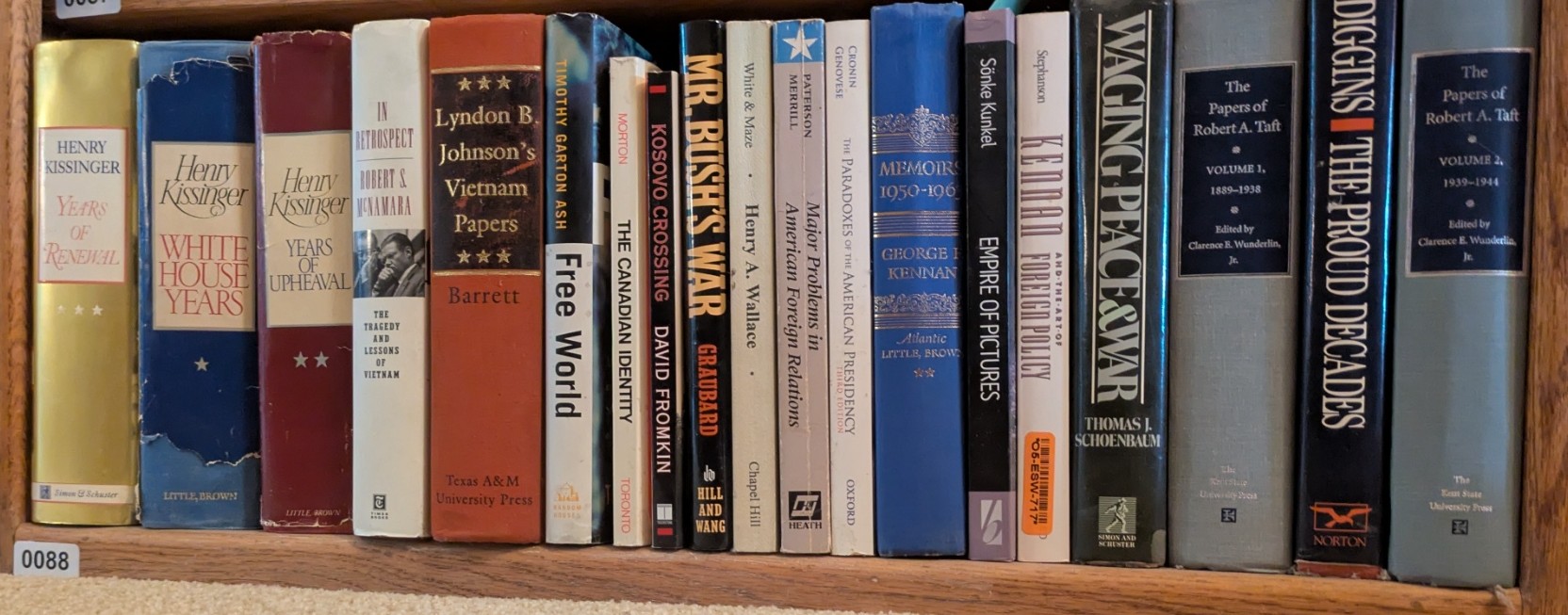 Photograph of Shelf 88; books are listed in top-to-bottom order alongside the photograph.