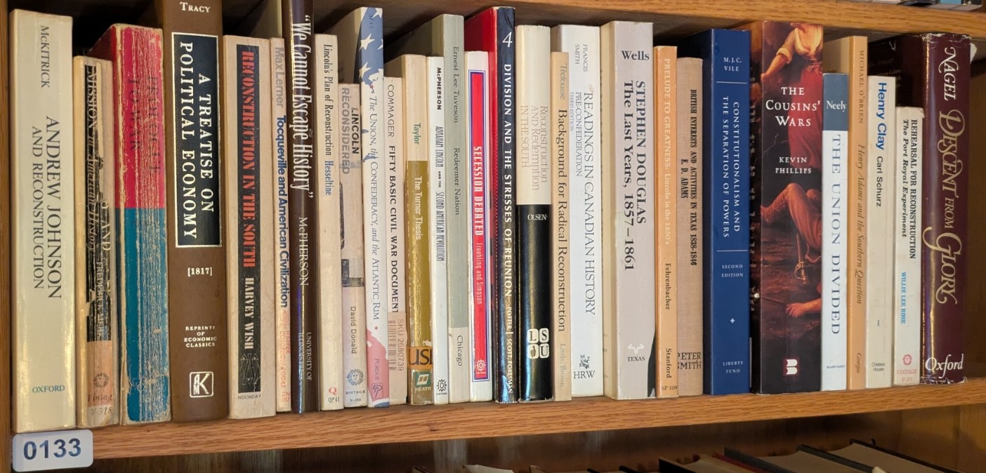 Photograph of Shelf 133; books are listed in top-to-bottom order alongside the photograph.